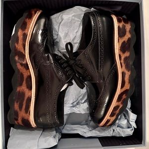 Prada black broque leather & leopard print calf hair lace up platform shoe. 38.5